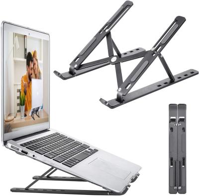 Cina Portable Foldable Adjustable Laptop Stand (Height) Adjustable Super Warm Aluminum Laptop Stand in vendita