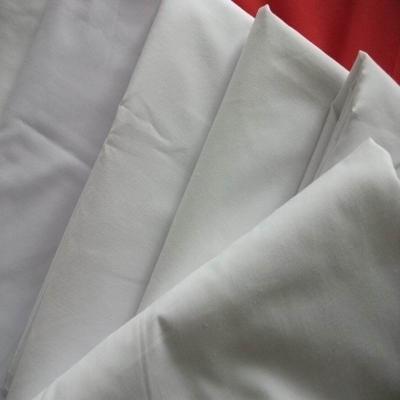 China Gray Fabric 40*40 133X72 Raw Cotton Stocklot Viable Cotton Fabric For Dress Textile for sale