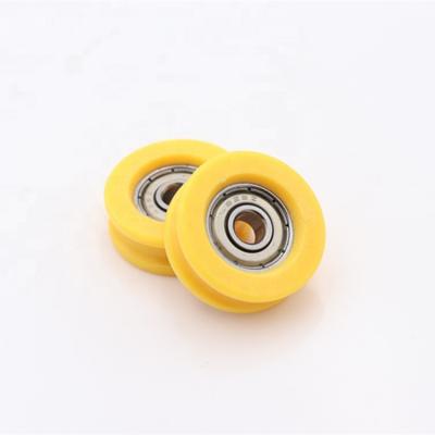 China Low U Groove Plastic Roller Wheels Smooth Price Round Nylon Pulley Wheels for sale