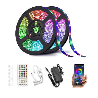 China 5M 10m Music Sync BT App Residential Christmas Decoration Lighting Outdoor 5050 RGB LED RF Strip Light for sale