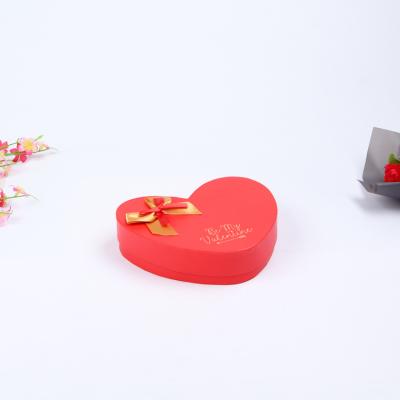 China Recyclable Heart Shaped Wholesale 12 Chocolate Valentine's Day Gift Box Four-color Handheld Gift Box for sale