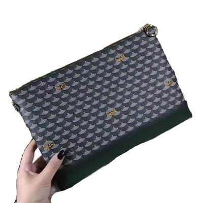 China 2020 European and American unisex fashion large capacity envelope fashion clutch bags personality women briefcase leather trim handbags for sale