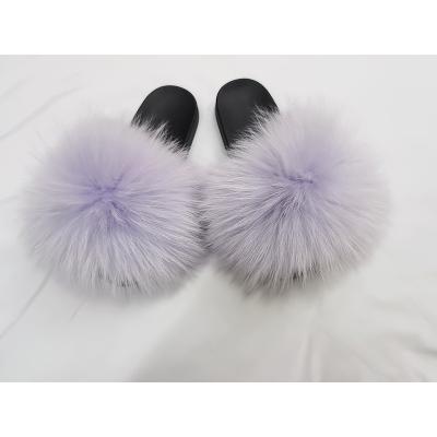 China Fashion Trend Indoor Outdoor Home Ladies Comfortable Open Toe Band Cross Slippers Winter Plush Fur Slippers For Women for sale