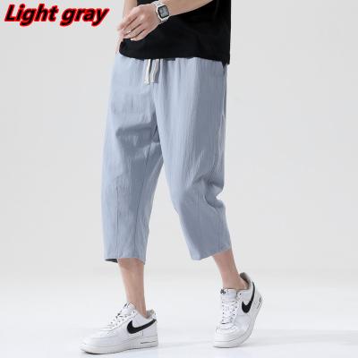 China QUICK DRY summer casual pants men's wild cotton and pants Nine point Korean trend loose canvas style pants plus size for sale