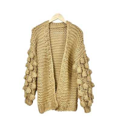 China Anti-wrinkle 100% very cute and stylish hand knit women's sweaters hollow out sight ladies luxury custom women sweater wool cardigan for sale