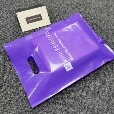 China Wholesale custom purple moisture proof die up plastic shopping bag with handle bag for make up good quality low price for sale