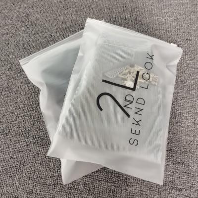 China Custom black frosted zipper lock bag low price high quality recyclable moq own logo apparel packaging for T-shirt for sale