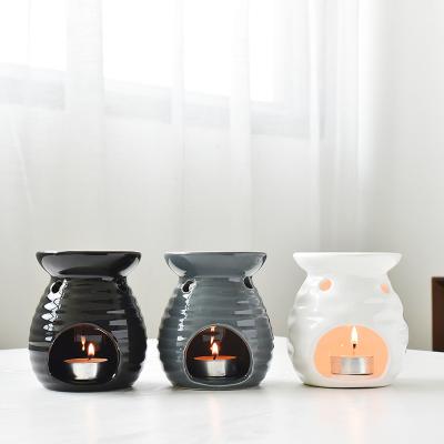 China New Christmas Elements Aromatherapy Hollow Seat Ceramic Aromatherapy Essential Oil Stove Perfume Lighting Handmade Hollow Fragrance Lamp for sale