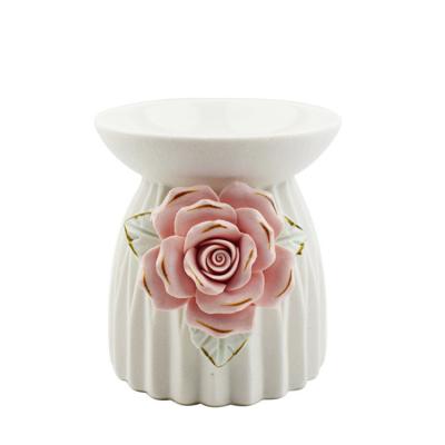 China Basic modern creative handmade sticky ceramic exquisite flower fragrance censer essential oil stove ceramic home crafts for sale