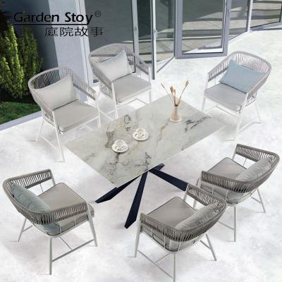 China Eco-freindly Garden story Outdoor patio recreational cane Garden dining table and chair creative waterproof sunscreen cord dinning table set for sale