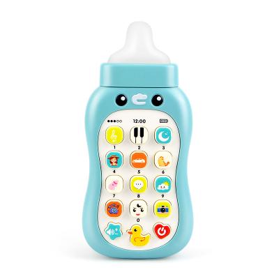 China Soft Toy Early Childhood Education Electric Milk Bottle Shape Baby Kids Baby Teether Toy Mobile Phone With Lightteething Gum for sale