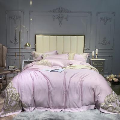 China Sunshine 100S Fabric Tencel Bedding Solid Color Comforter Anti-static Gold Embroidered Blanket Four Piece Sheet Set for sale