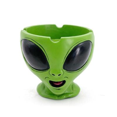 China Custom Logo Polyresin Resin Shaped Ashtray 3D Alien Position Shaped Resin Ashtray for sale