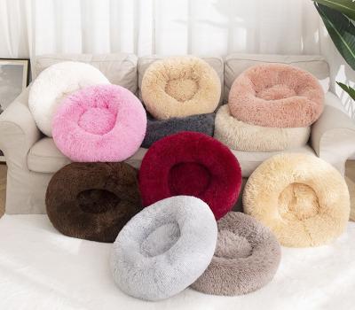 China Breathable Soft Plush Cat Dog Pet Bed Nest Round Shape Mat Autumn And Winter Keep Donut Warm Indoor Pad Cute Sofa Kennel for sale