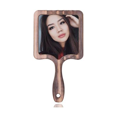 China Small Contemporary 5.5 Inch Hand Held Wood Mirrors With Wood Handle for sale