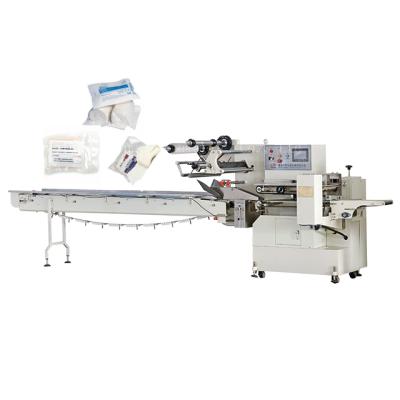 China Food 3 Servos Bandage Packing Machine Automatic Medical Bandage Flow Type Wrapping Machine for sale