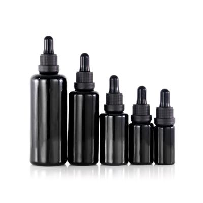 China Premium 10ml 15ml 30ml 50ml 100ml 200ml Personal Care Premium Flat Shoulder Black Violet Glass Serum Oil Dropper Pump Bottle for sale