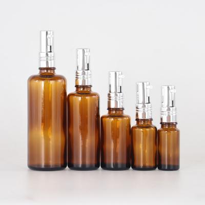 China Hot Selling Refillable Brown Cosmetic Essential Oil Glass Bottles 5 10 15 20ml 30ml 50 100ml 200ml Amber Glass Bottle for sale