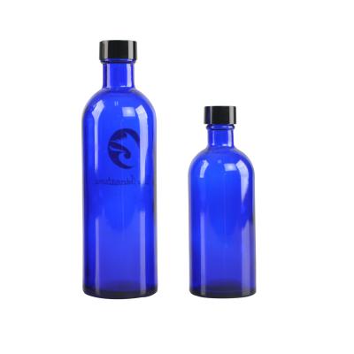 China 30ml 50ml 100ml 150ml 200ml 250ml personal care blue glass bottle for water lotion serum with black plastic screw cap logo top customized sale for sale