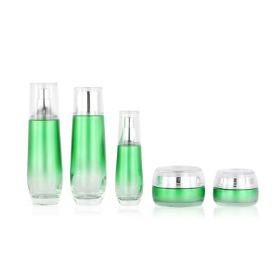 China Green Glass Cosmetic Packaging Jar And Toner Bottle And Cream Lotion Recyclable for sale