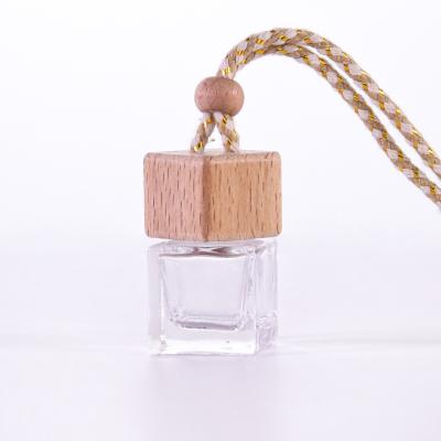 China Recyclable Car Perfume Bottle Air Freshener Diffuser Hanging Empty Glass Refillable Bottle For Auto Smell Essential Oil Pendant Bottle for sale