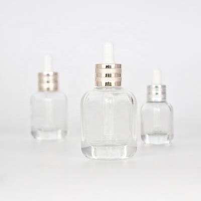 China Cosmetic 10/20/40ml square dropper glass bottle for essential oil and serum for sale