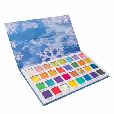 China Free sample profesional waterproof makeup sets 32 colors snowflake eyeshadow palette christmas pressed glitter eyeshadow paltte for sale