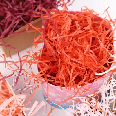 China Custom Moisture Proof Valentine's Day Creativity Gifts Box Packaging Filling Crease Wavy Raffia Shredded Paper for sale