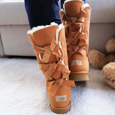 China Lady Customized Thermal Bow Logo Warm Genuine Leather Fur Girls Snow Boots For Women for sale