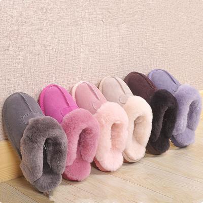 China Customized 2021 Trend Winter Fashion Outdoor Indoor Flat Warm Suede Leather Faux Cow Fur Sheepskin Fluffy Home Shoes Women Slippers for sale