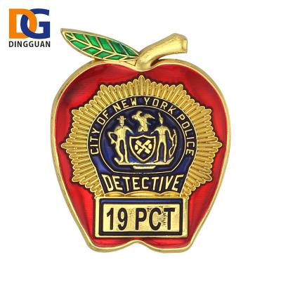 China Custom Engraved Hard Metal North America Police Enamel Pin Badge for sale