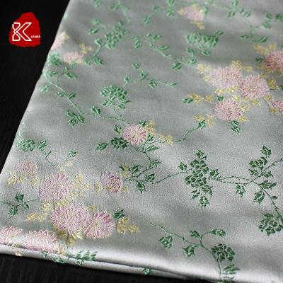 China Shrink-Resistant 100% Jacquard Polyester Brocade Fabric For Chinese Children Garment Clothes for sale