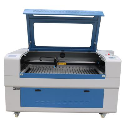 China Laser engraving good character laser cutter/CO2 laser engraving machine LXJ1390 for cutting wood/acrylic/leather for sale