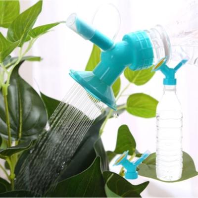 China Plastic Garden 4 Colors 2 In 1 Potted Plant Drink Bottle Water Sprinkler Flower Sprinkler Home Watering Bottle Sprinkler for sale