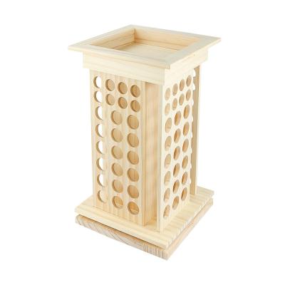 China Sustainable Wooden Essential Oil Rotating Rack Can Rotate Multi-Layer Essential Oil Bottle Display Storage Rack for sale