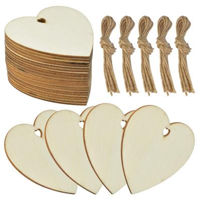 China Unpolished Perforated Natural Wood Heart Shape Christmas Valentine's Day Wedding Festival Wooden Heart Trim Rope Europe Wooden Ornaments for sale