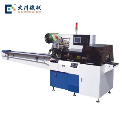 China Double Servo Horizontal Commodity Reciprocating Flow Packing Machine For Plastic Bag for sale