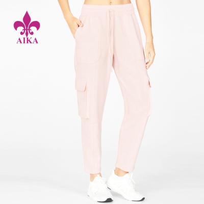 China Cute Breathable Pink Design With Multiple Pockets Slim Fit Sport Tracksuit Gym Joggers For Women for sale