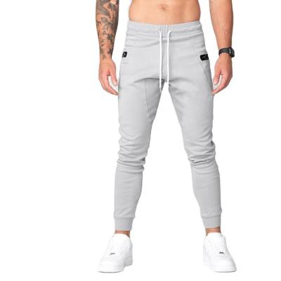 China New Design Breathable Custom Logo Printing Track Pants Workout Sports Wear Slim Fit Men Cotton Gym Jogger Pants With Side Pocket for sale