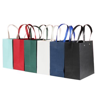 China Recyclable Hot Red Gold Green Gold Price Production Sale Pink Luxury Paper Bag Gift Paper Bag Handbag for sale