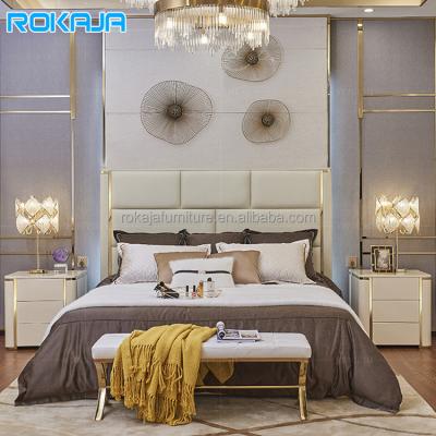 China Hot Sale King Size Bed Gold Adjustable Modern Leather Headboard Stainless Steel Double Bed Hotel Villa Bedroom Cream Sleep Bed for sale