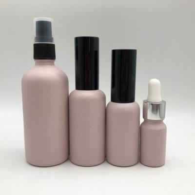 China Matte Pink 10ml 15ml 30ml 50ml 100ml Essential Oil Cosmetic Bottle Glass for sale