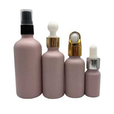 China Luxury Customized Cosmetic Factory Direct Essential Oil Dropper Bottles Makeup Serum Pink Dropper Bottle With Rose Gold Top for sale