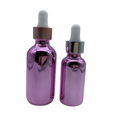 China 60ml Pink Glass Boston Cosmetic Bottle Custom Dropper for sale