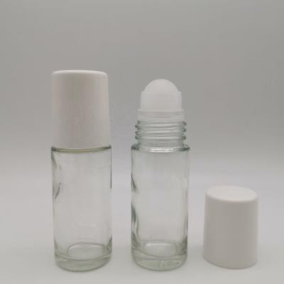 China Cosmetic Manufacturers Supply Wholesale Transparent Empty Glass Plastic Roll On Essential Oil Bottle for sale