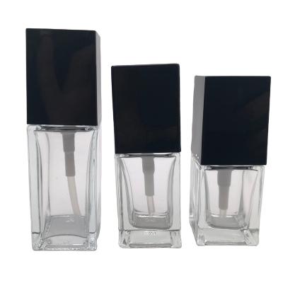 China Personal Care Empty Clear Base Pump Glass Bottle for sale