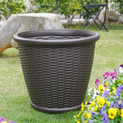 China Fancy pastoral light balcony patio ware injection molding chinese wicker garden planter rattan large flower pot for sale