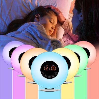 China Hot Selling Radio Amazon Sunrise Wake Up Light Alarm Clock Speaker FM Radio with 7 Colors Changing Night Light for Bedroom for sale