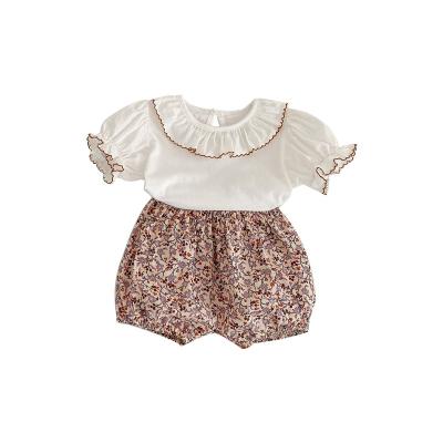 China 2023 Fashion Anti-shrink Cotton Baby Collar Ruffle Summer Baby Doll Short Sleeve Shirt+Floral Shorts Baby Two-piece Suit for sale