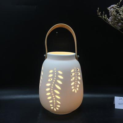 China Home and Garden Decoration Fashion Design Candle Holder Home Hanging Ceramic Lantern for sale